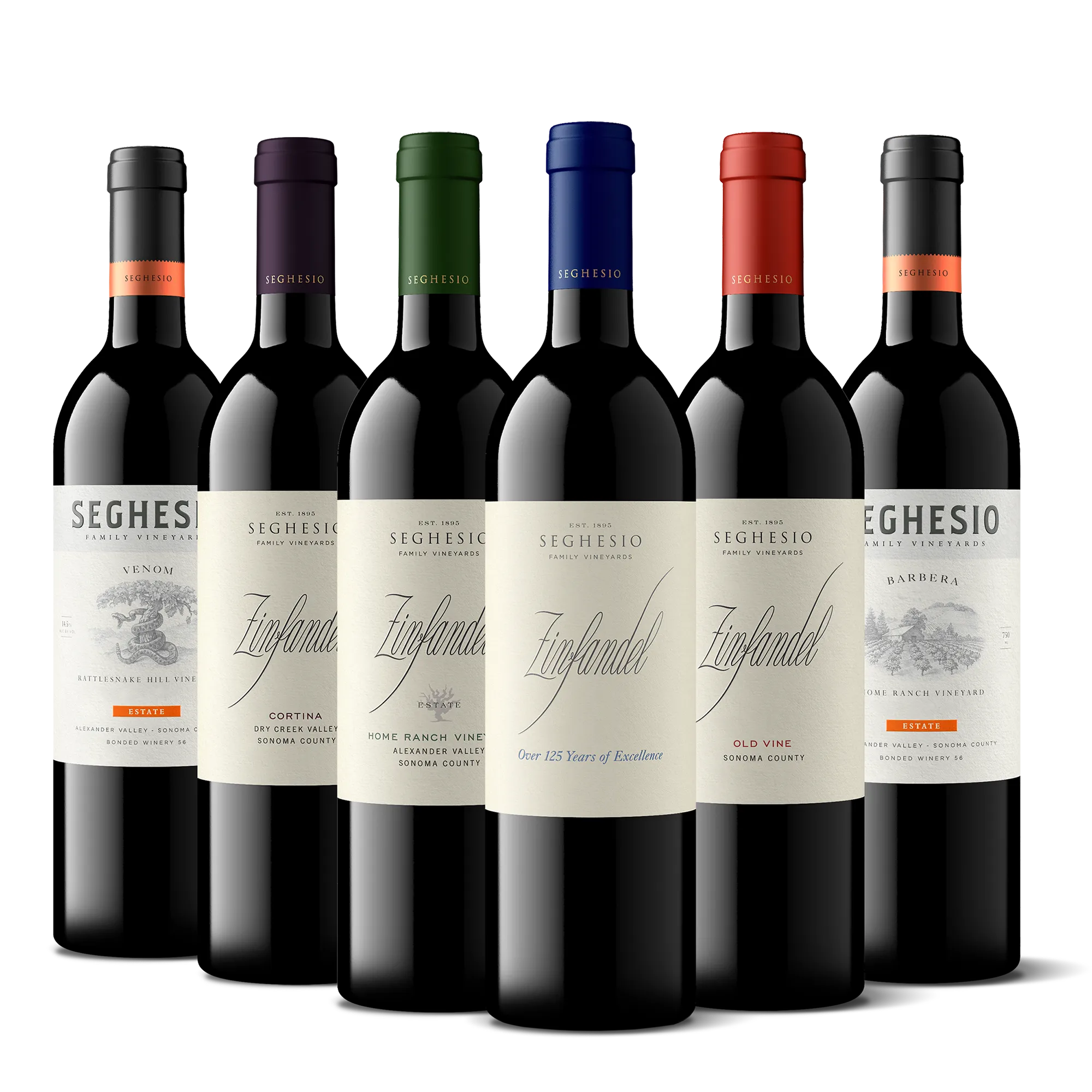 Six bottles of Seghesio wine are lined up in a row, each with distinct labels and colored bottle caps, featuring varieties such as Zinfandel, Venom, and Barbera—including selections reminiscent of the Premiere Sonoma Zinfandels 2-Bottle Gift—all standing against a plain white background.