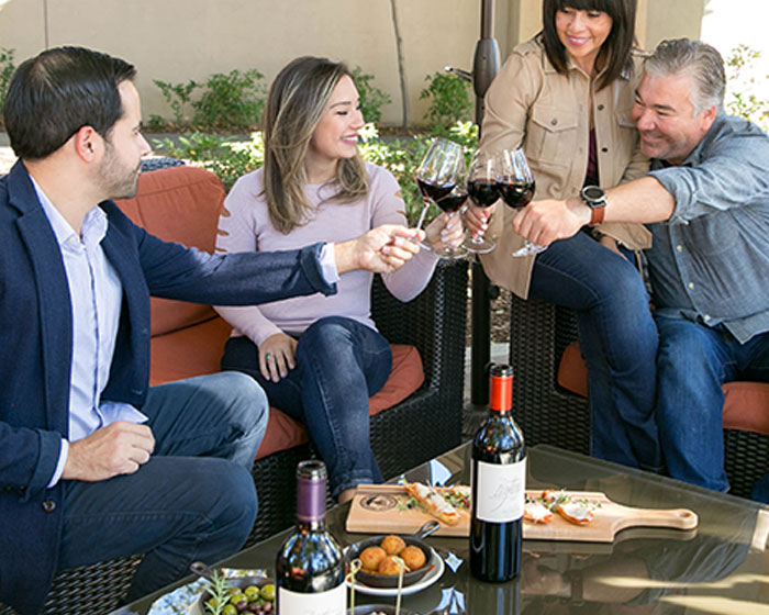 Group enjoying picnic and wine at Seghesio Family Vineyards