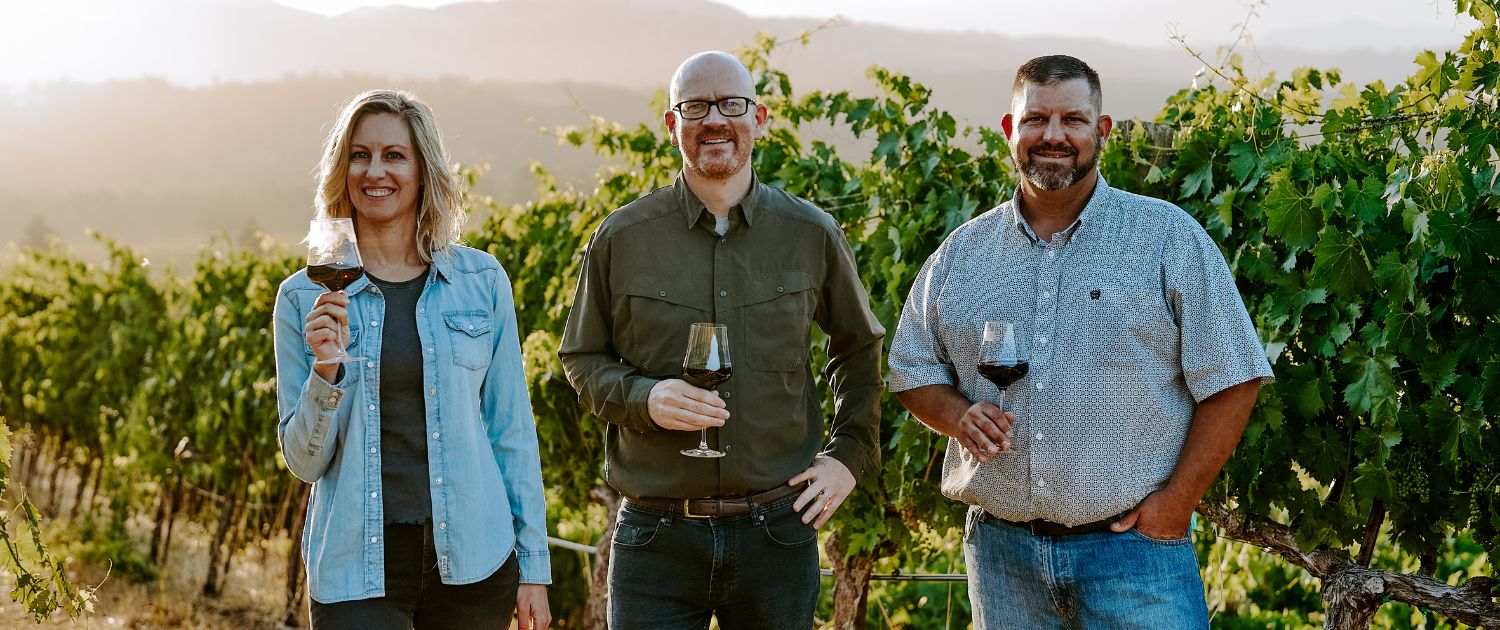Winemaking team in vineyard