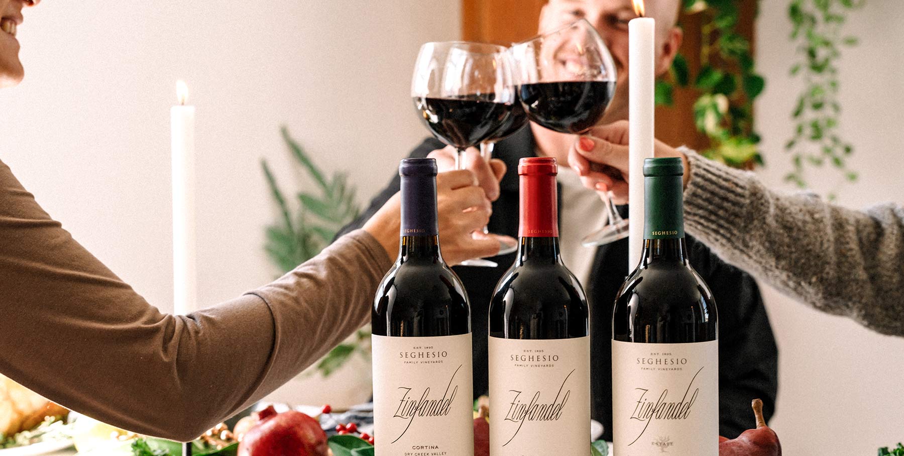 Three Cortina Zin bottles at a holiday table