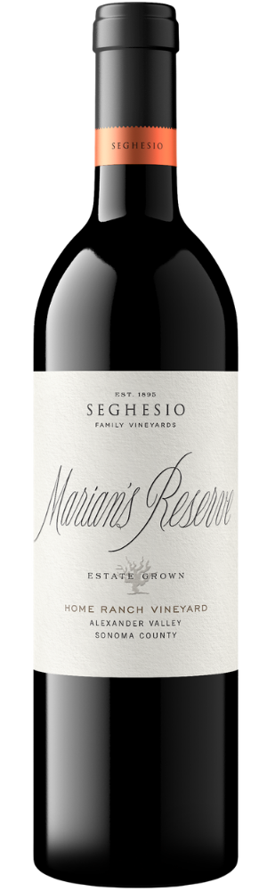 A bottle of Seghesio Family Vineyards Marians Reserve red wine with a cream-colored label and orange foil on the neck. The label notes its from Home Ranch Vineyard, Alexander Valley, Sonoma County.